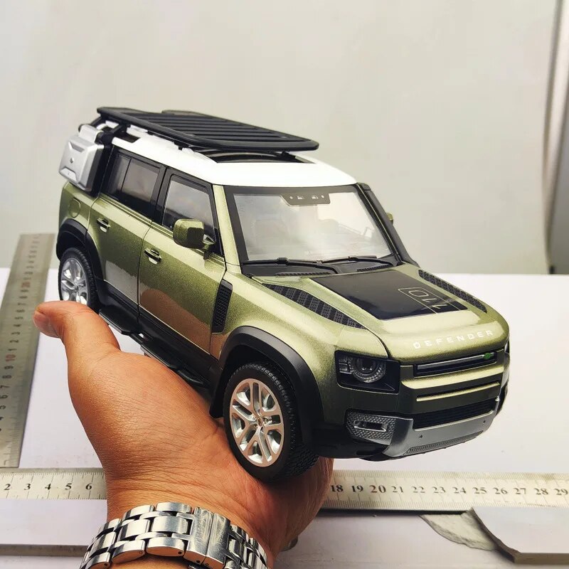 Land rover defender on sale diecast 1 18